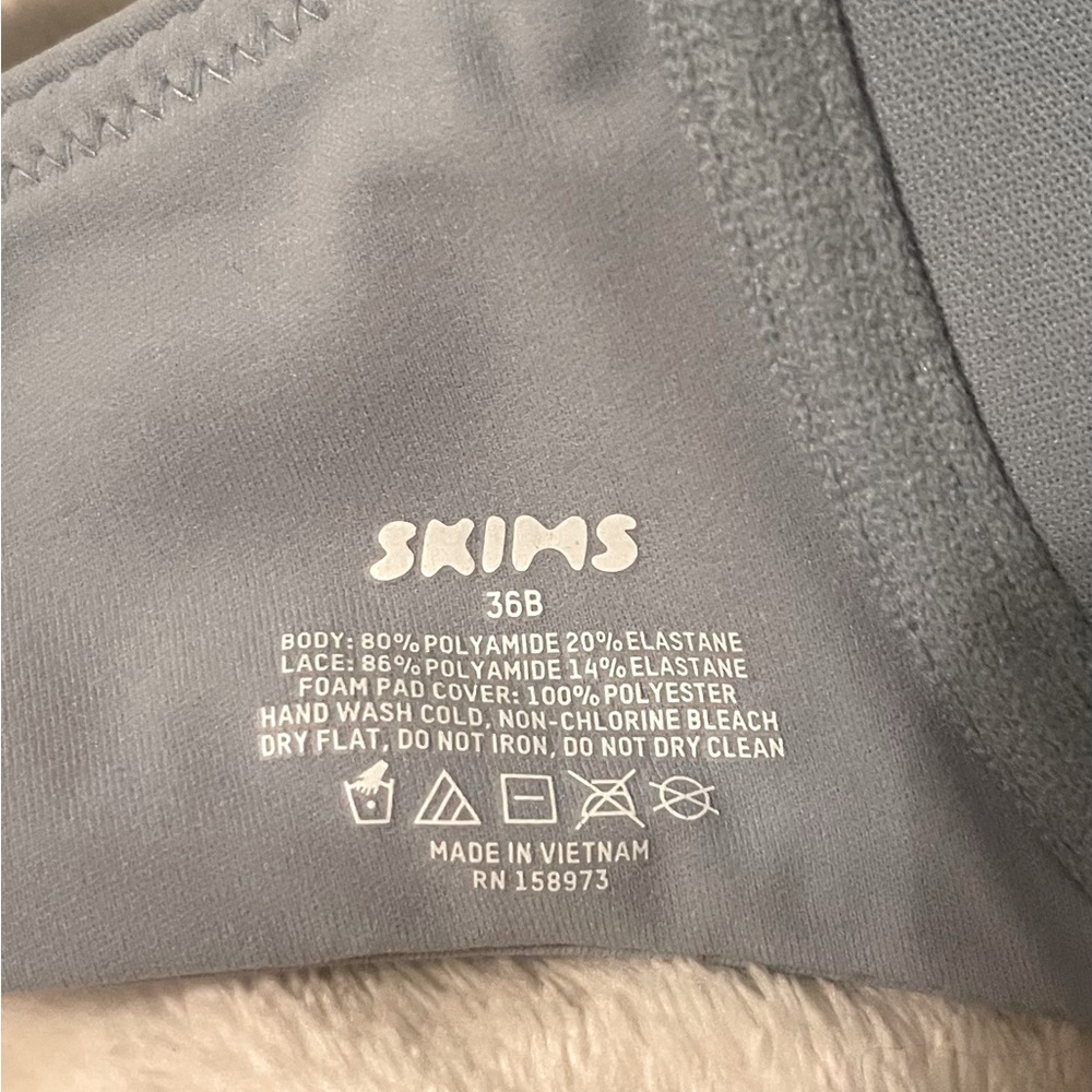 Skims bra 36b. Fits everybody lace push-up bra. Color denim. Smoke/pet free home